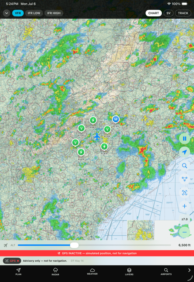 Animated NOAA radar loop drawn over the VFR sectional showing convective echoes